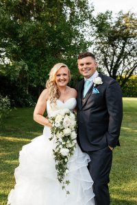 bride and groom with trailing bouquet, flowers