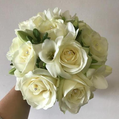 All white compact bouquet with sparkles